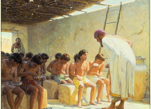 In an ancient Mesopotamian school, boys write on clay tablets. In an ancient Mesopotamian school, boys write on clay tablets.