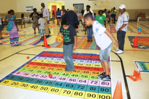 Students on Multiplication Hop Mat